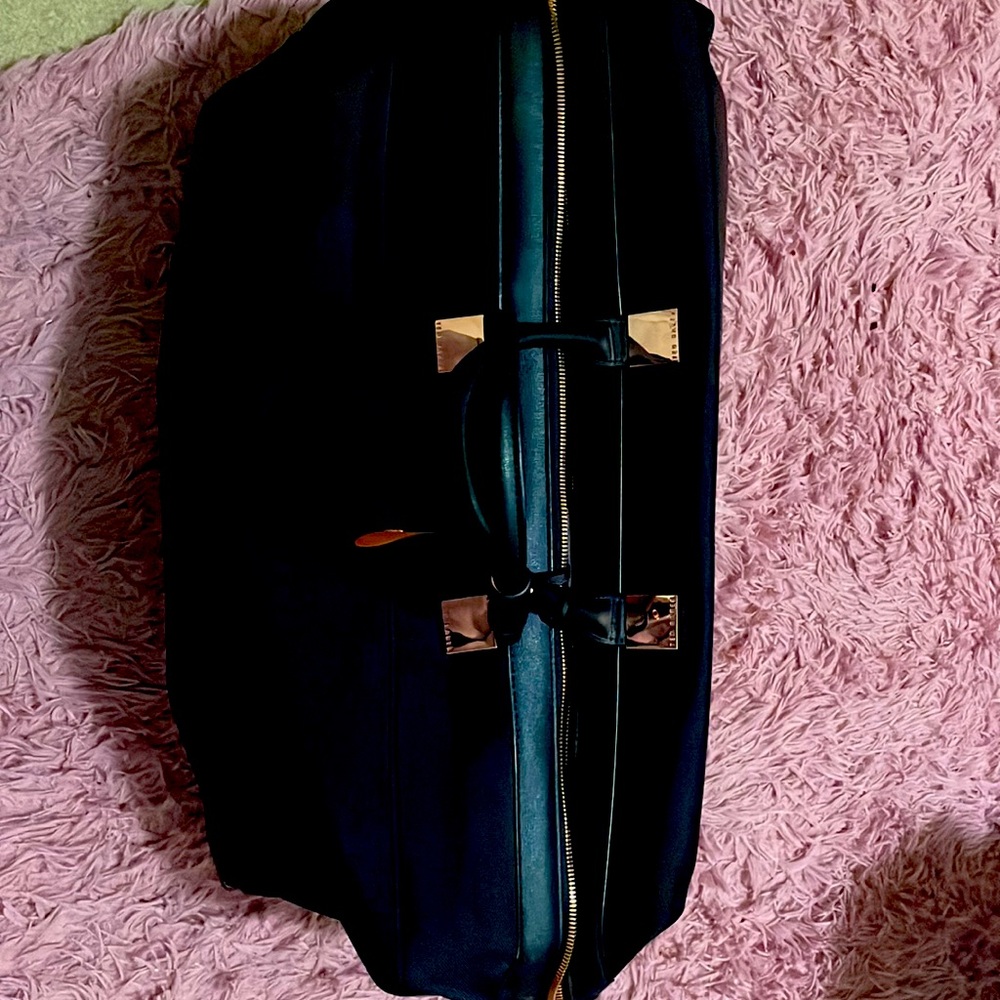 Ted Baker London travel bag for sale.